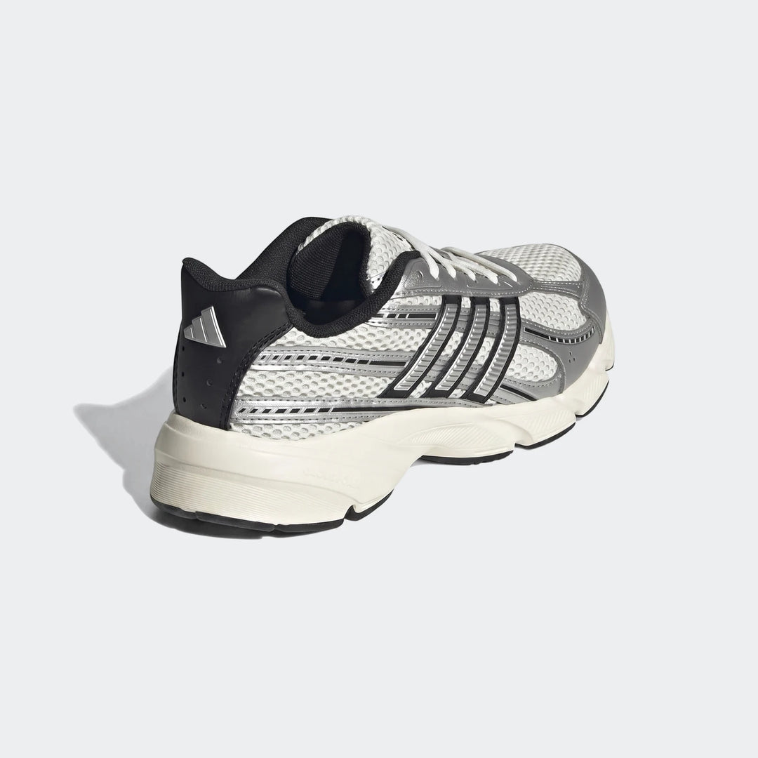 Adidas Technochaos 2000 Shoes in white, silver, and black, featuring mesh and synthetic overlays, showcased from a rear-side