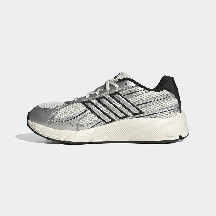 Adidas Technochaos 2000 men's athletic shoes in white, silver, and black, featuring a mesh upper and chunky sole, shown in a