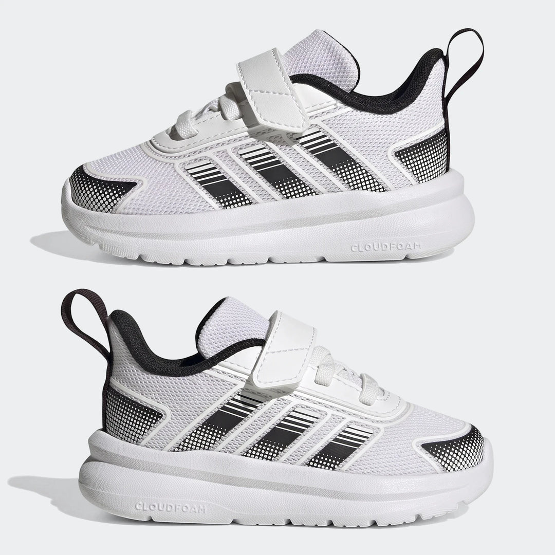 Pair of white and black Adidas Tensaur Run 4.0 infant shoes, featuring hook-and-loop closures and a side view. Ideal for