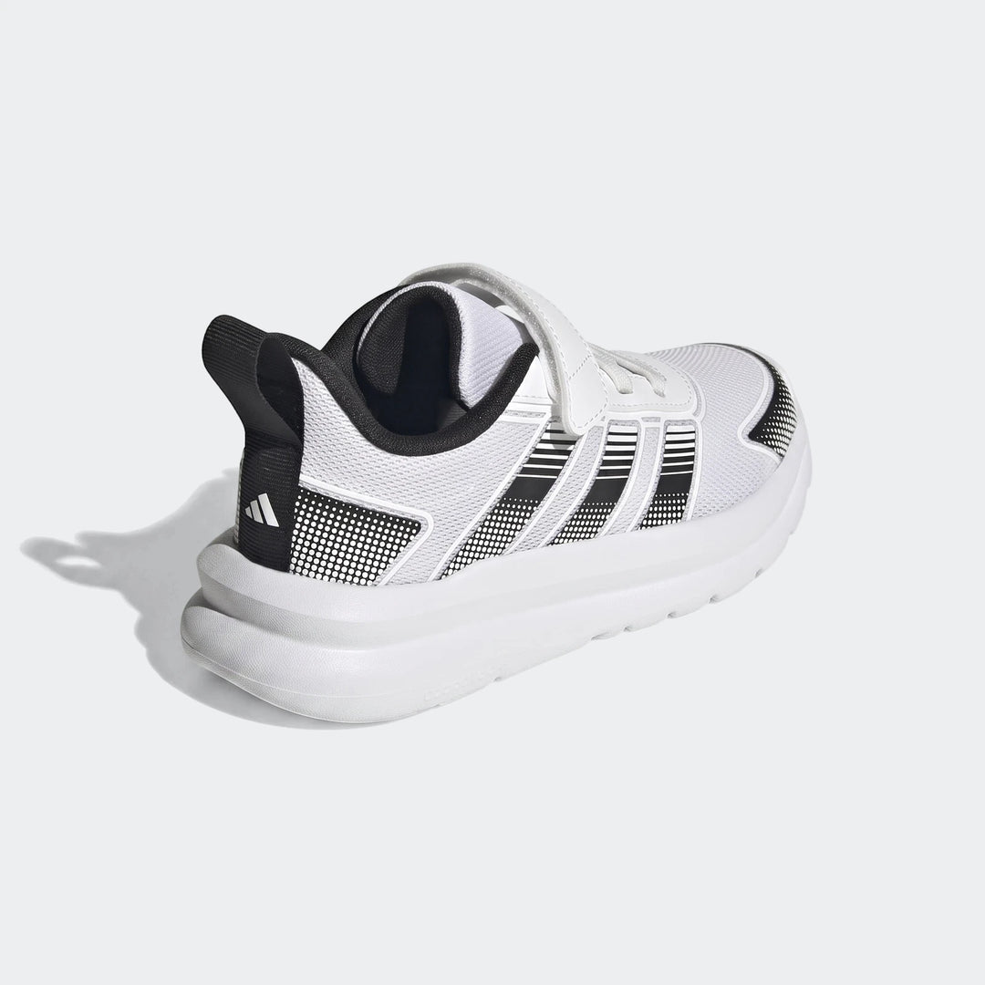 White and black Adidas Tensaur Run 4.0 children's shoes with hook-and-loop strap closure, shown from a rear-quarter view.