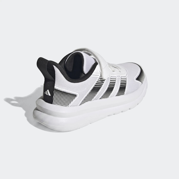 White and black Adidas Tensaur Run 4.0 children's shoes with hook-and-loop strap closure, shown from a rear-quarter view.