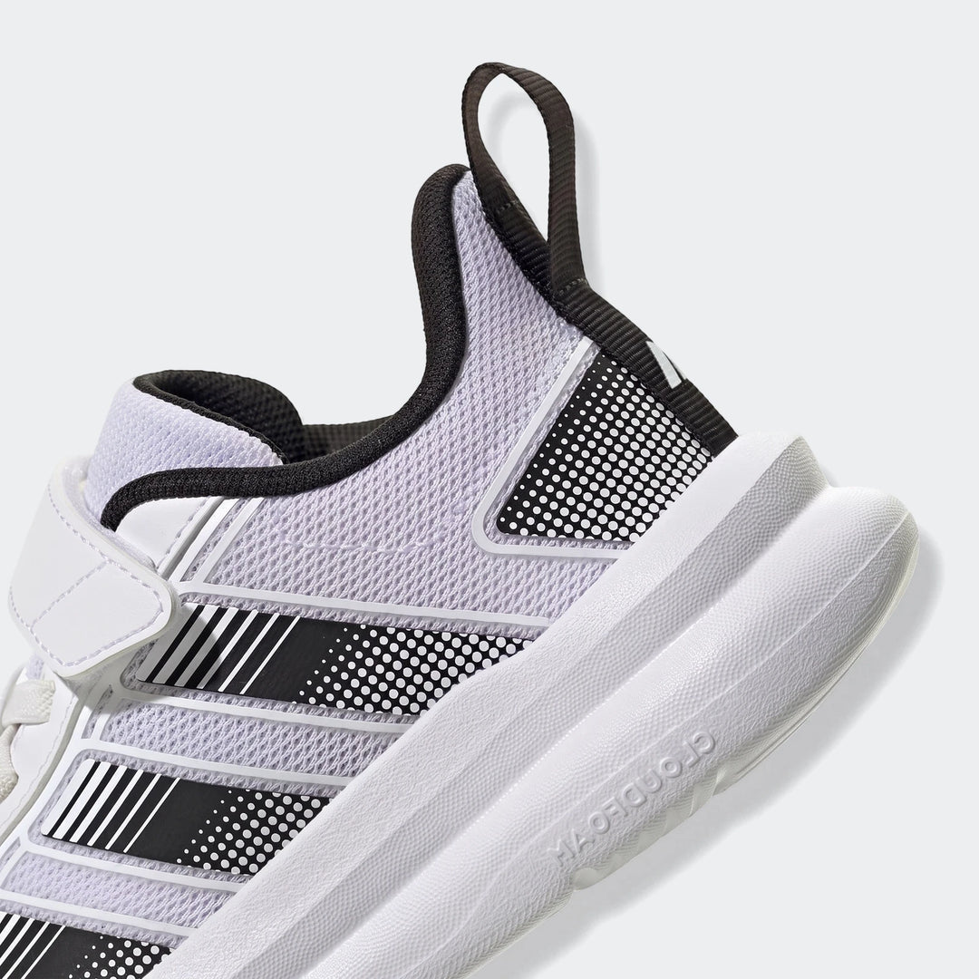 Close-up side view of Adidas Tensaur Run 4.0 children's athletic shoes in white and black mesh with a velcro strap and thick