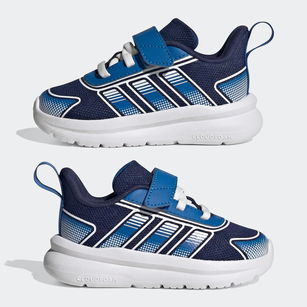 Two pairs of navy blue Adidas Tensaur Run 4.0 infant shoes with white stripes, velcro straps, and Cloudfoam soles, side view.