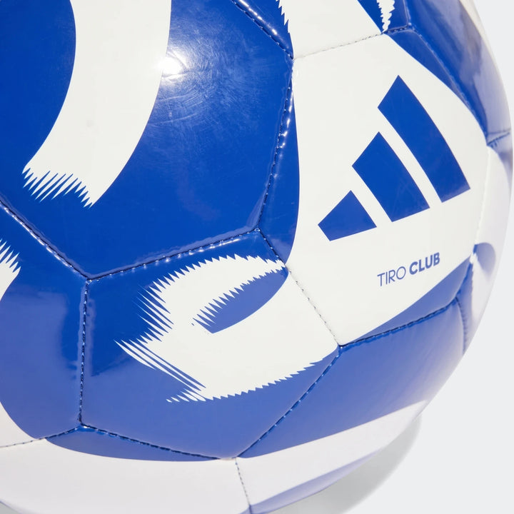 Close-up of a blue and white Adidas Tiro Club size 4 soccer ball featuring the Adidas logo and 'Tiro Club' text.