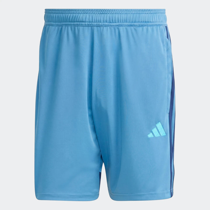 Light blue Adidas Tiro Essentials athletic shorts, front view, featuring darker blue side stripes and an Adidas logo.