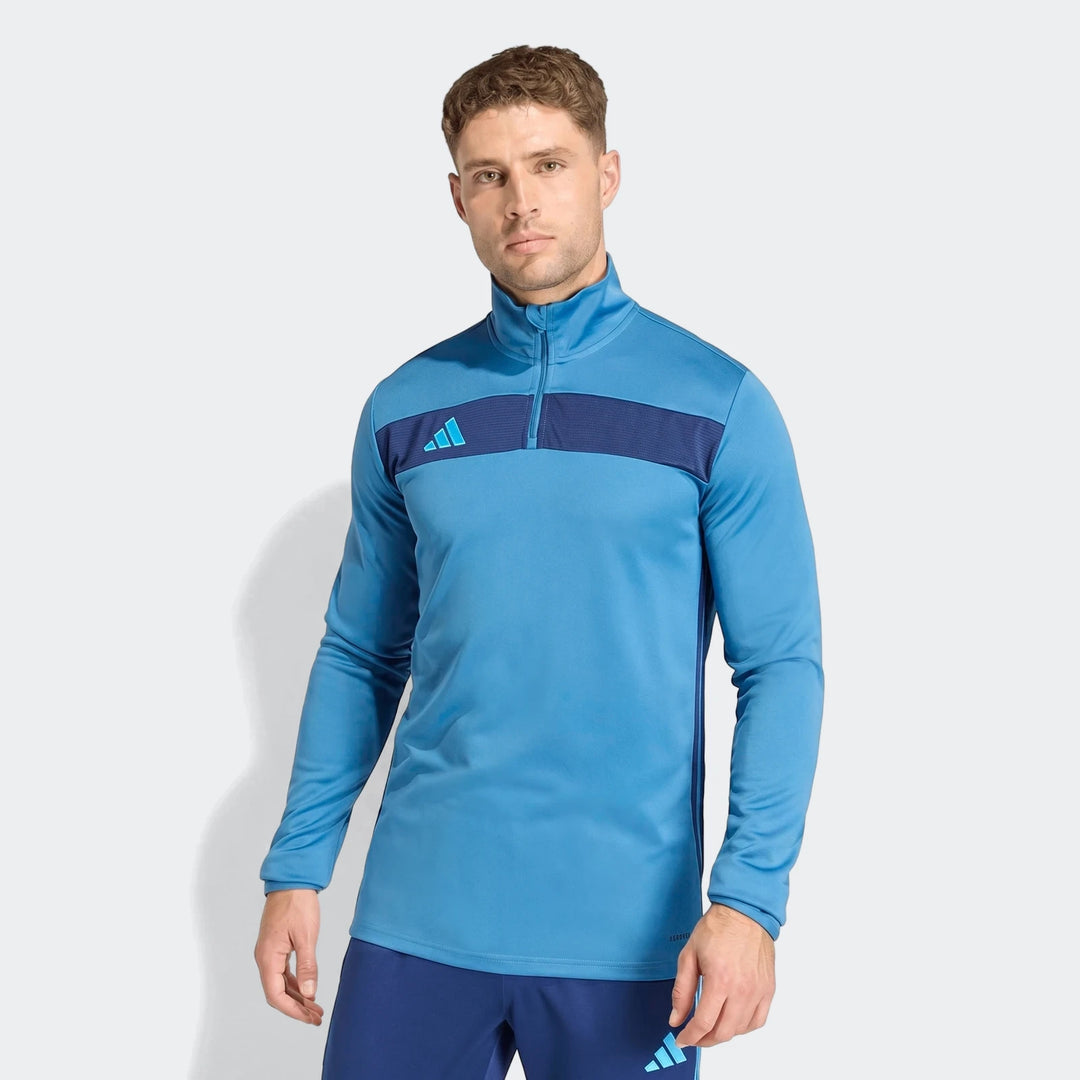 Men's blue Adidas Tiro Essentials Track Top featuring a quarter-zip design and prominent chest branding.