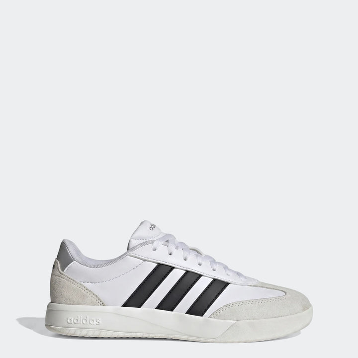 Adidas Vl Court Fc Ft White Sneakers with black stripes, shown from a side view. Classic low-top design with white upper and