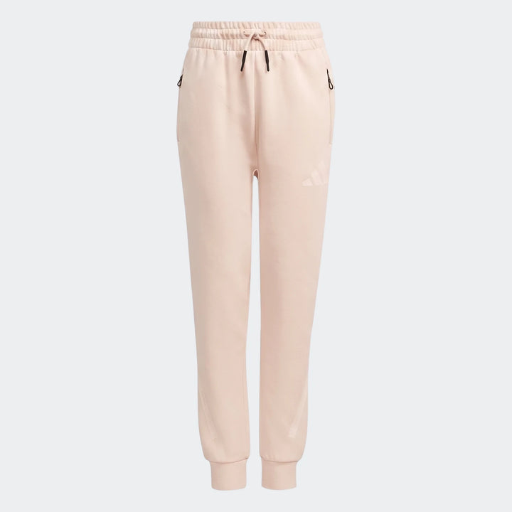 Light pink Adidas Youth Z.N.E. Track Pants displayed in a flat lay, featuring a comfortable fit and zippered pockets.