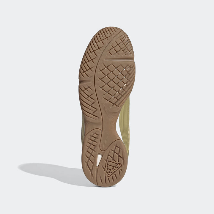 Adidas Z.N.E. Track Top brown rubber outsole with intricate grip patterns, revealing olive upper accents, bottom view.