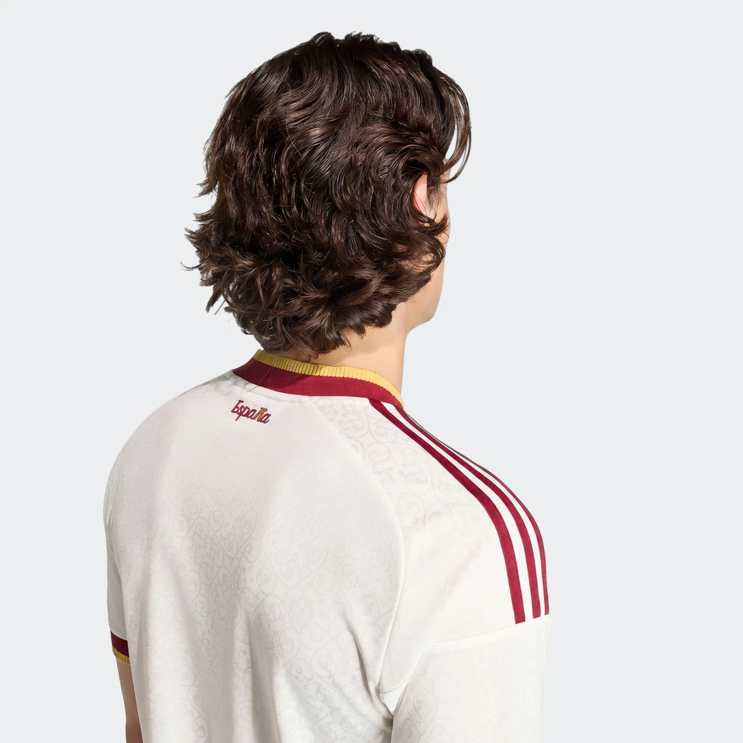 White Adidas Z.N.E. Track Top with red shoulder stripes and "España" text on the back, shown from the rear on a model.