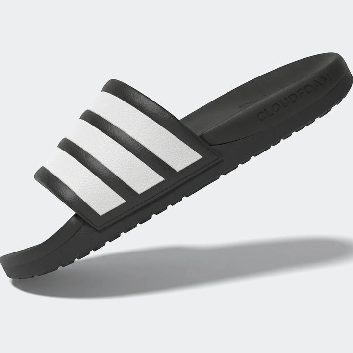 Adilette Comfort 2.0 Slides, a single black slide with white stripes, displayed from an angled view.