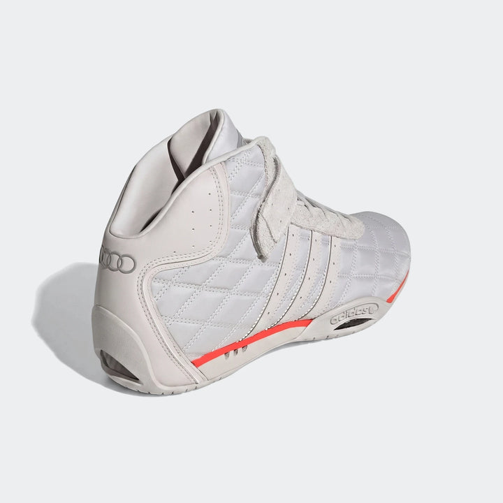 Light grey Adiracer Hi Audi Revolut F1 Team high-top racing shoes with red accents and quilted texture, angled view.