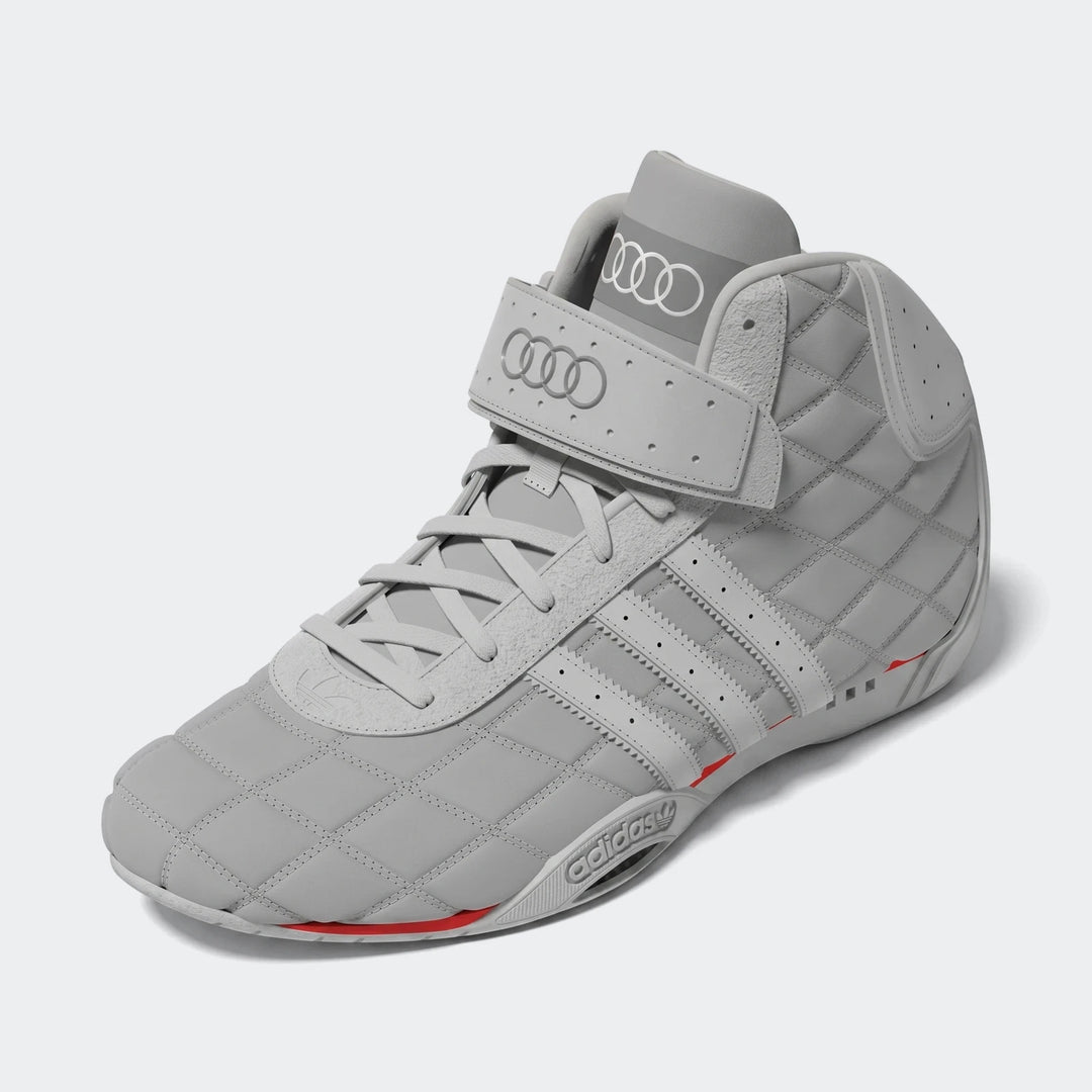 Grey high-top Adiracer Hi Audi Revolut F1 Team racing shoes with red accents and quilted details, side view.