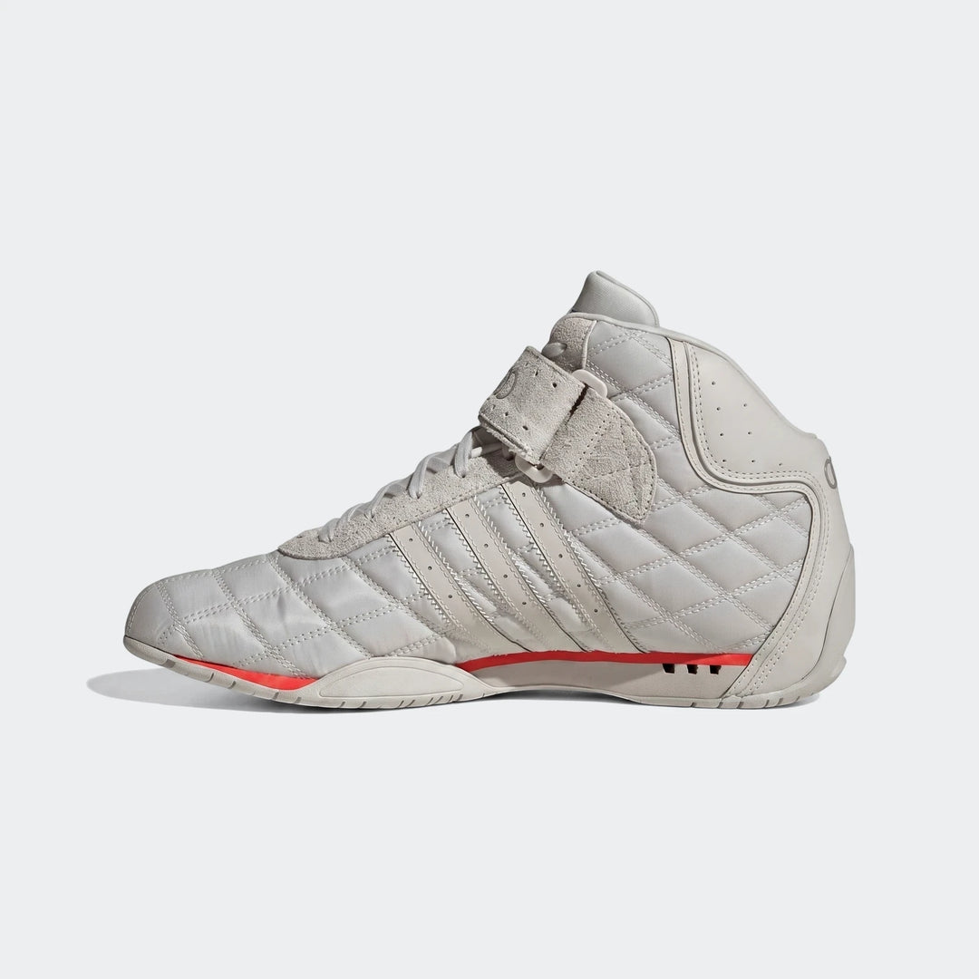 Adiracer Hi Audi Revolut F1 Team Shoes in light grey with a quilted pattern and red accents, shown from a side profile view.