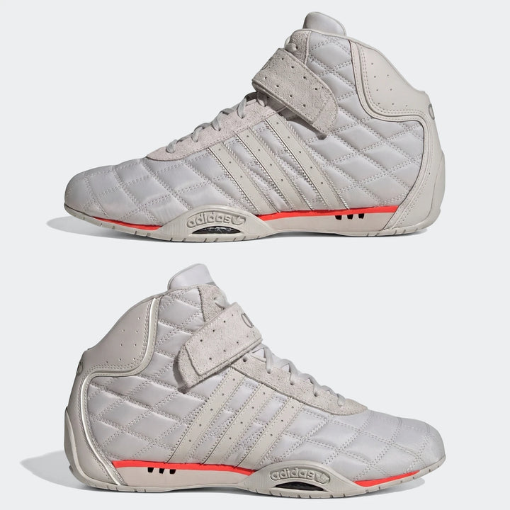 Pair of light grey Adiracer Hi Audi Revolut F1 Team high-top racing shoes with quilted uppers and coral sole accents.