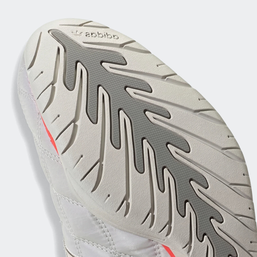 Close-up view of the Adiracer Hi Audi Revolut F1 Team Shoe, showcasing its white upper and gray patterned sole.
