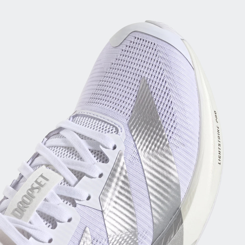 Close-up of the front top of white and silver Adizero Dropset Pro training shoes, showcasing the mesh upper and prominent