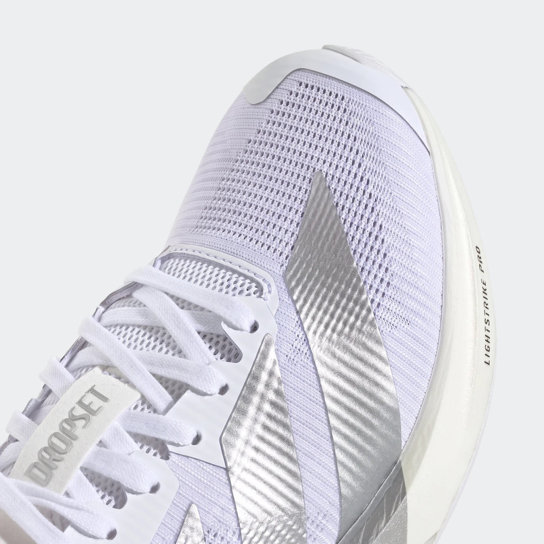 Close-up of the front top of white and silver Adizero Dropset Pro training shoes, showcasing the mesh upper and prominent
