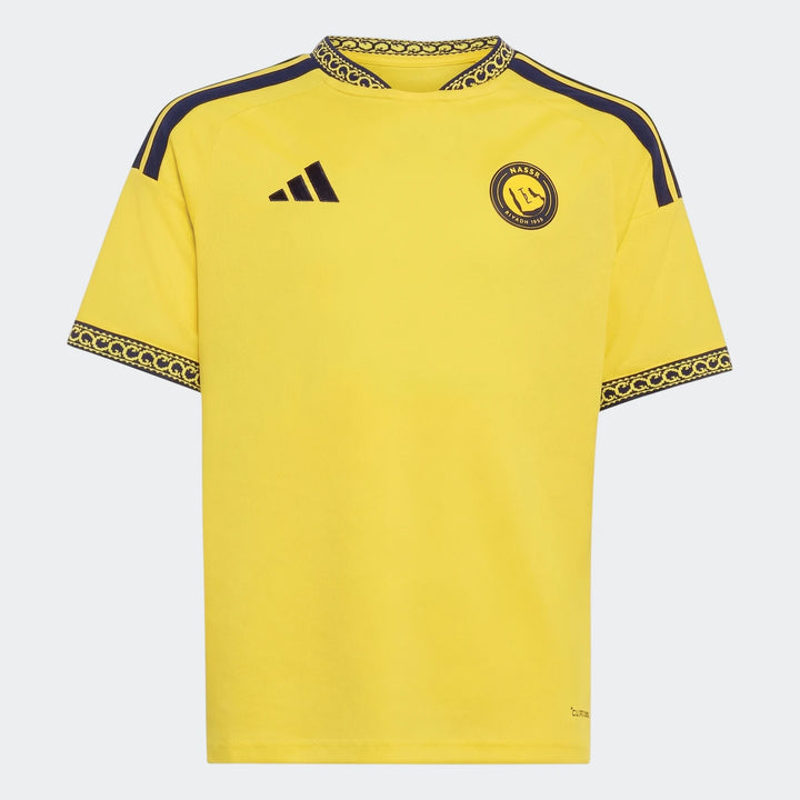 Al Nassr Fc 26/27 Home Jersey for kids, featuring a vibrant yellow color with dark blue stripes and club crest, displayed