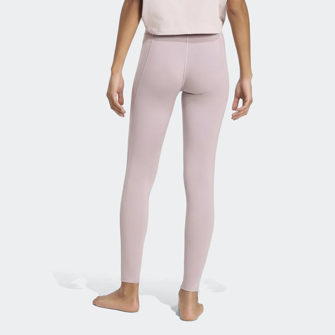 Light purple All Me Essentials Full-Length Tights worn by a model from the back, showcasing the fit and fabric.