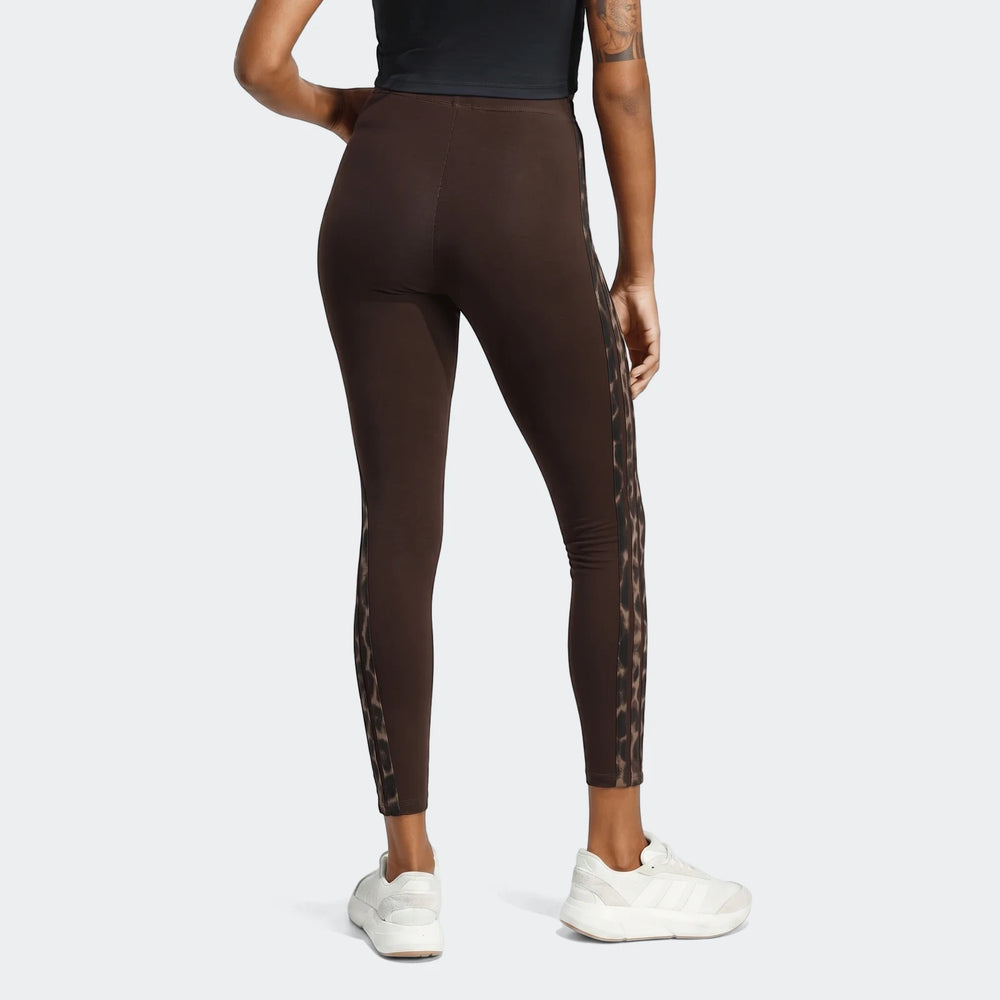 Brown All-Over Print Infill Leggings with a leopard print side stripe, shown from the rear on a model.
