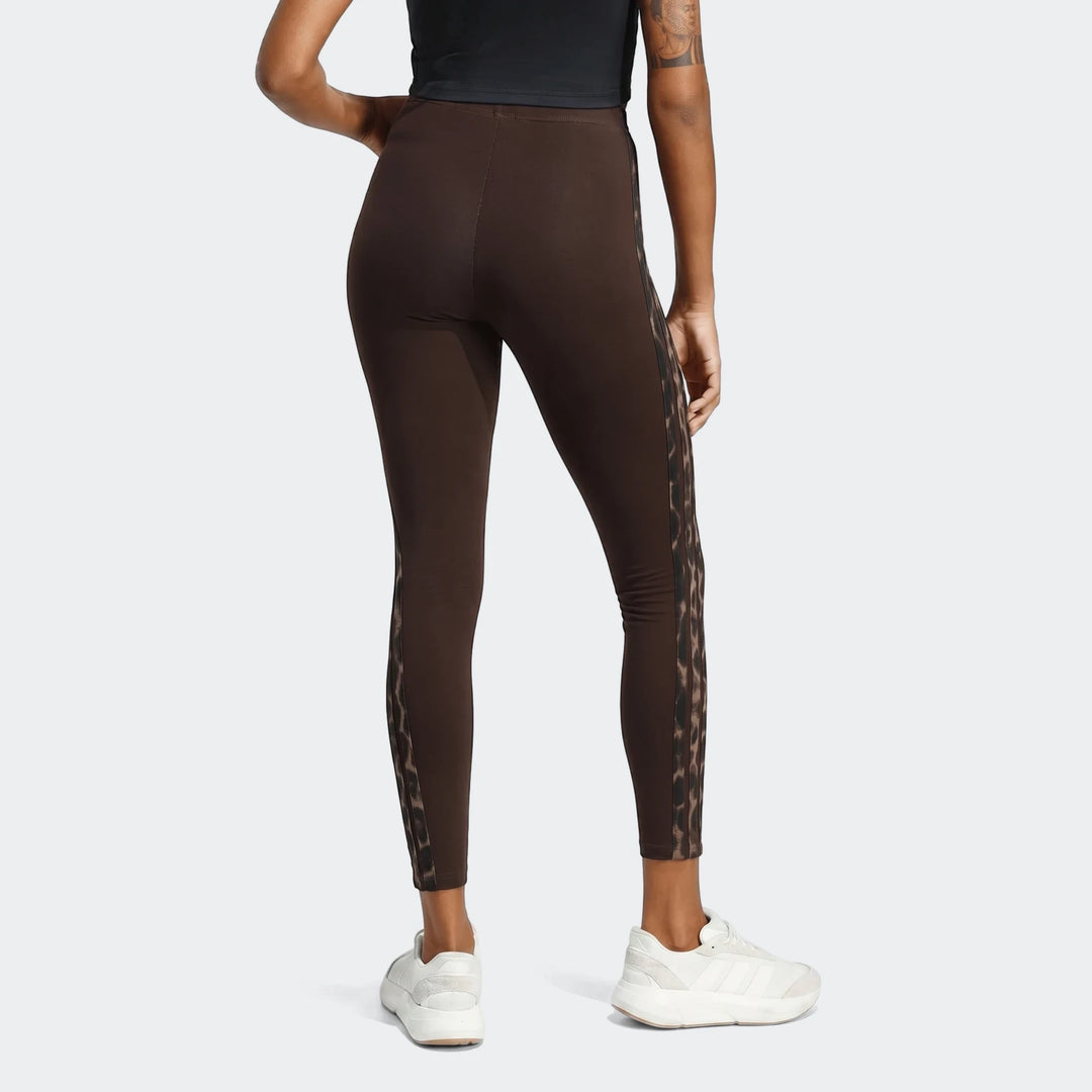Brown All-Over Print Infill Leggings with a leopard print side stripe, shown from the rear on a model.