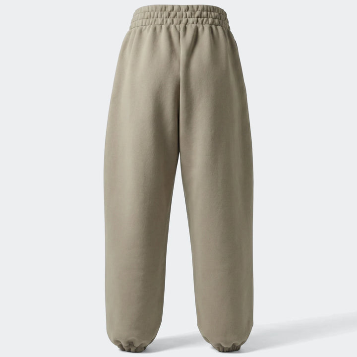 Light brown All Season Slim Pants, slim fit with elasticated cuffs, displayed from the back view for e-commerce.