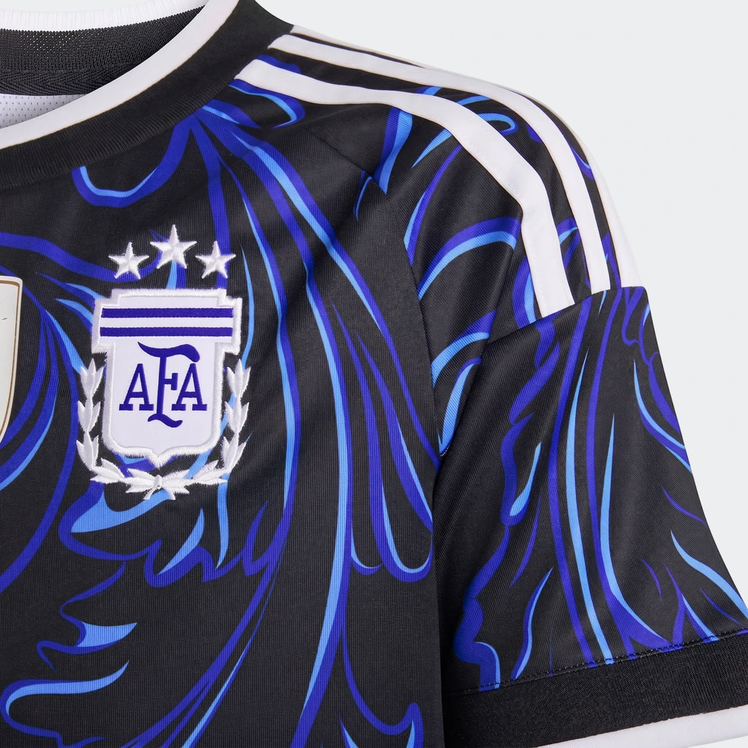 Argentina 25/26 Away Jersey Youth, black with blue abstract patterns, featuring the AFA logo and Adidas stripes. Close-up