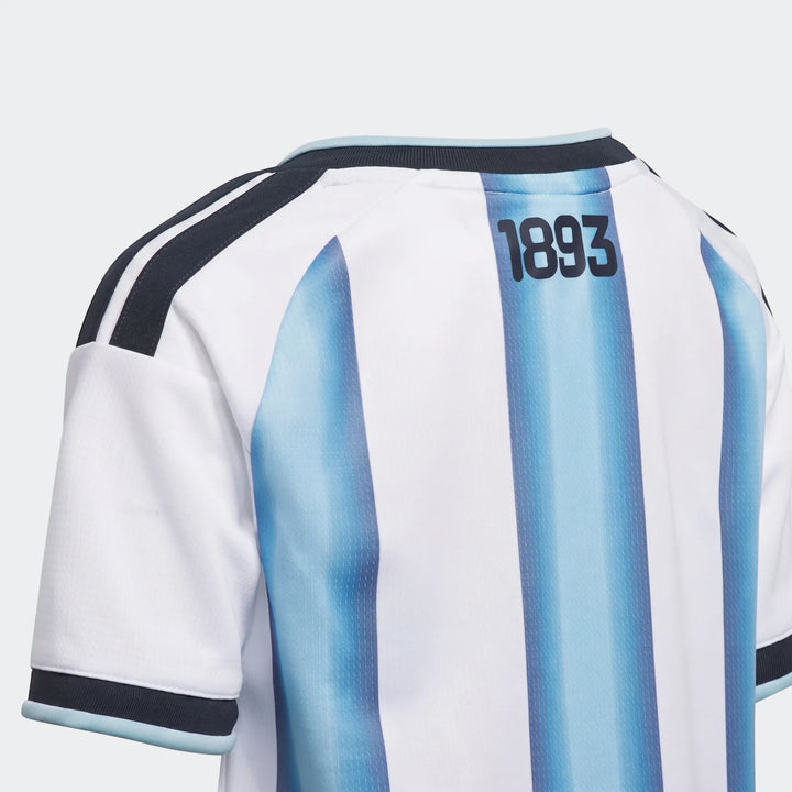 Argentina 26 Home Kids Set jersey, back view showing white and light blue stripes and '1893' detail.