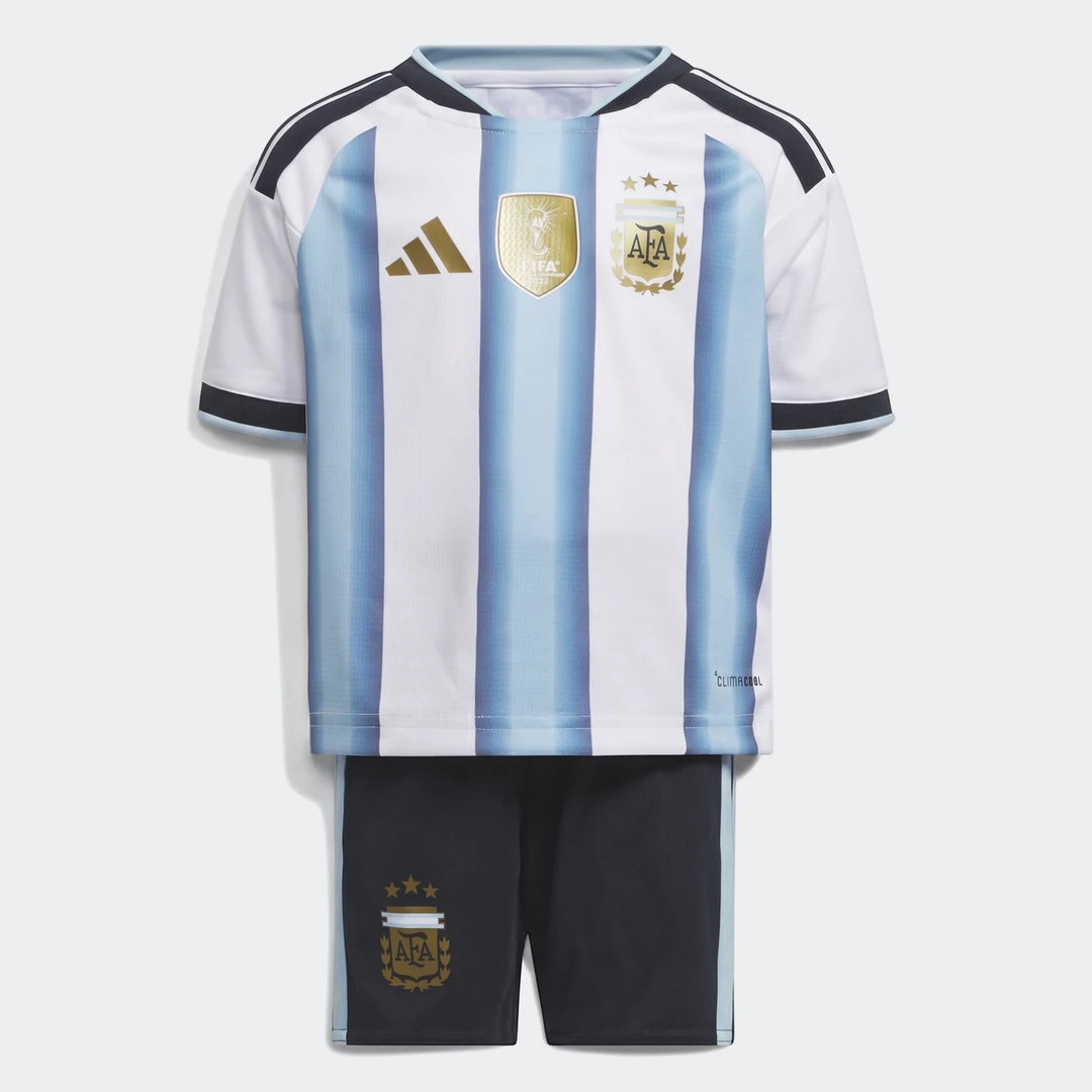 Argentina 26 Home Kids Set with white and light blue striped jersey and dark blue shorts, front view.