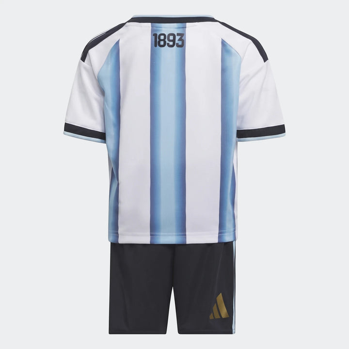 Argentina 26 Home Kids Set, white and light blue striped jersey with black collar and shorts with gold logo, back view.