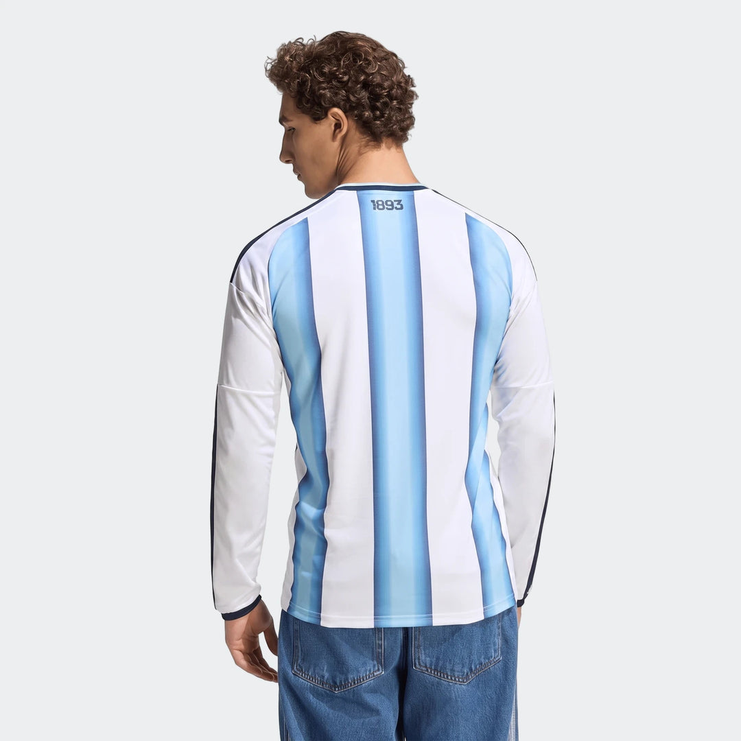 Men's Argentina 26 Home Long Sleeve Jersey with white and light blue stripes, viewed from the back on a model wearing blue