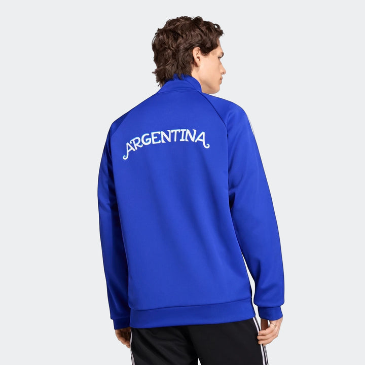 Male model wearing a blue Argentina Originals Track Top, viewed from the back showing the white 'Argentina' script.