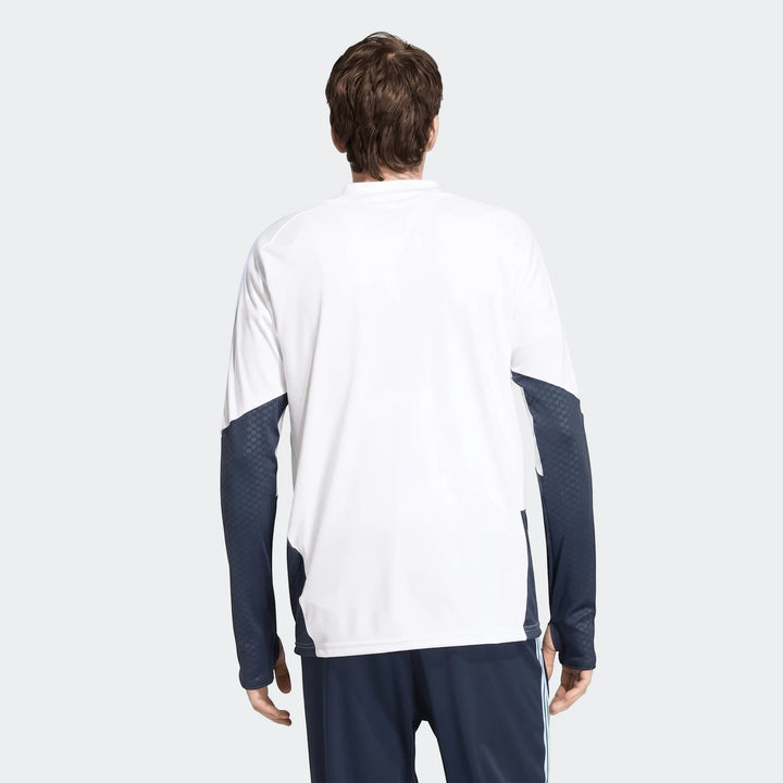 Back view of a male model wearing an Argentina long-sleeved training top in white and navy blue, showcasing the design.