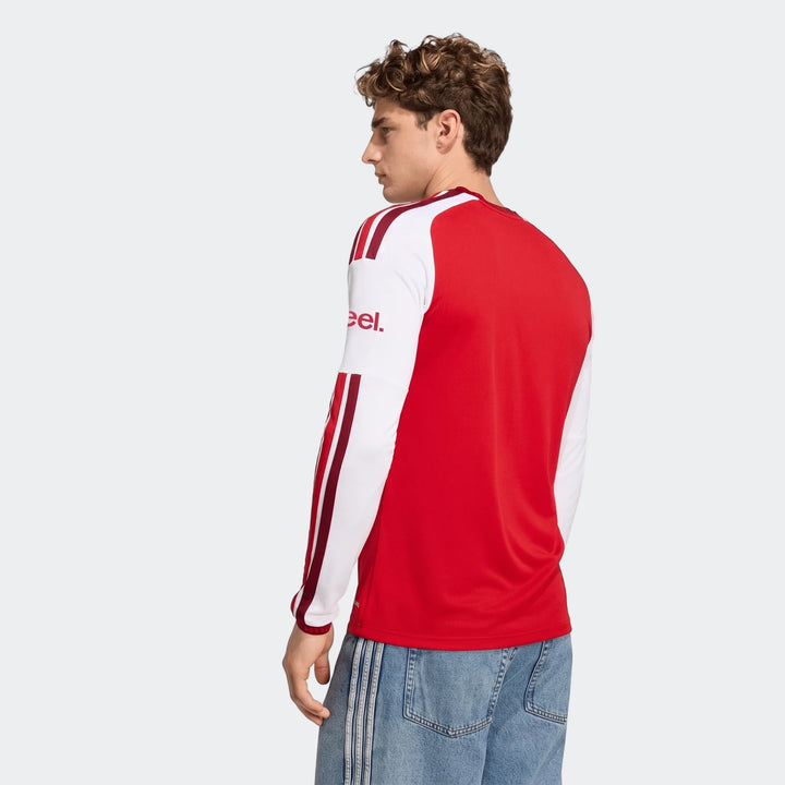 Male model from behind wearing an Arsenal FC 26/27 Home Long Sleeve Jersey in red and white with maroon stripes.