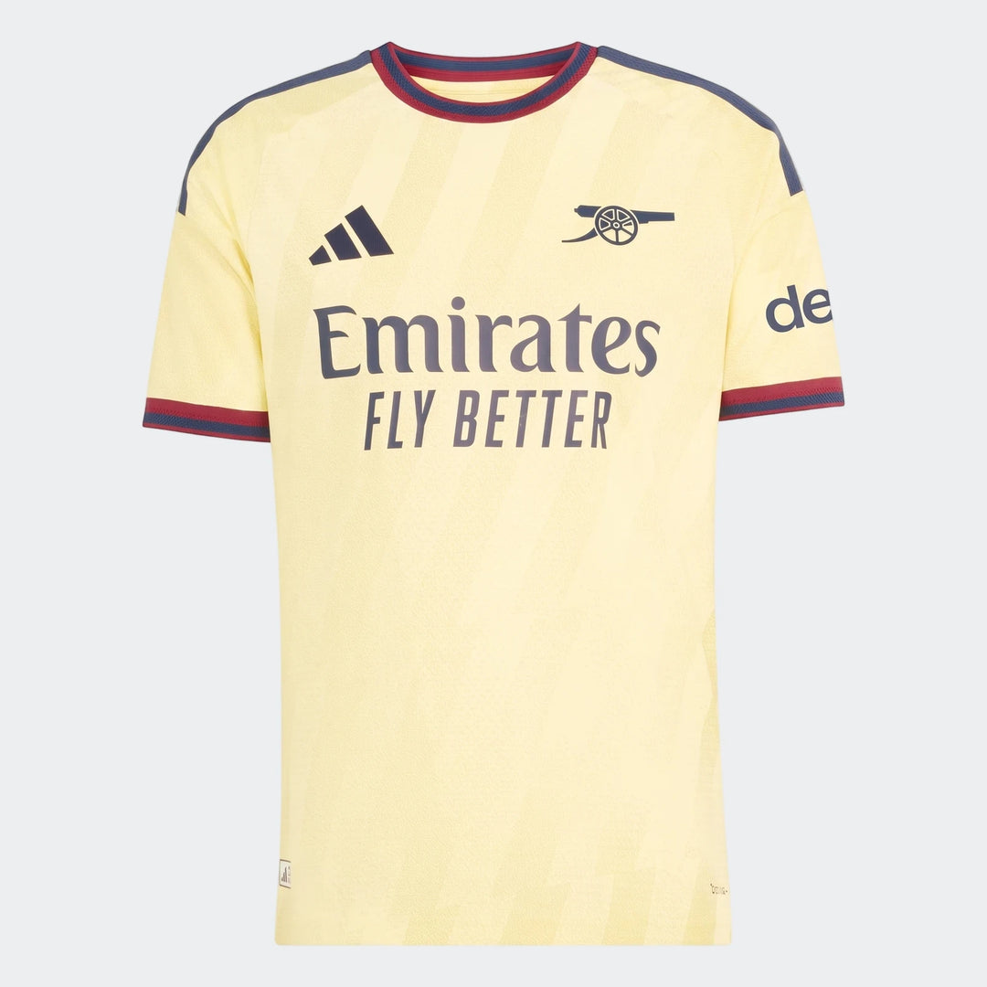 Arsenal FC 26/27 Third Authentic Jersey in yellowish cream with blue and red details, front view.