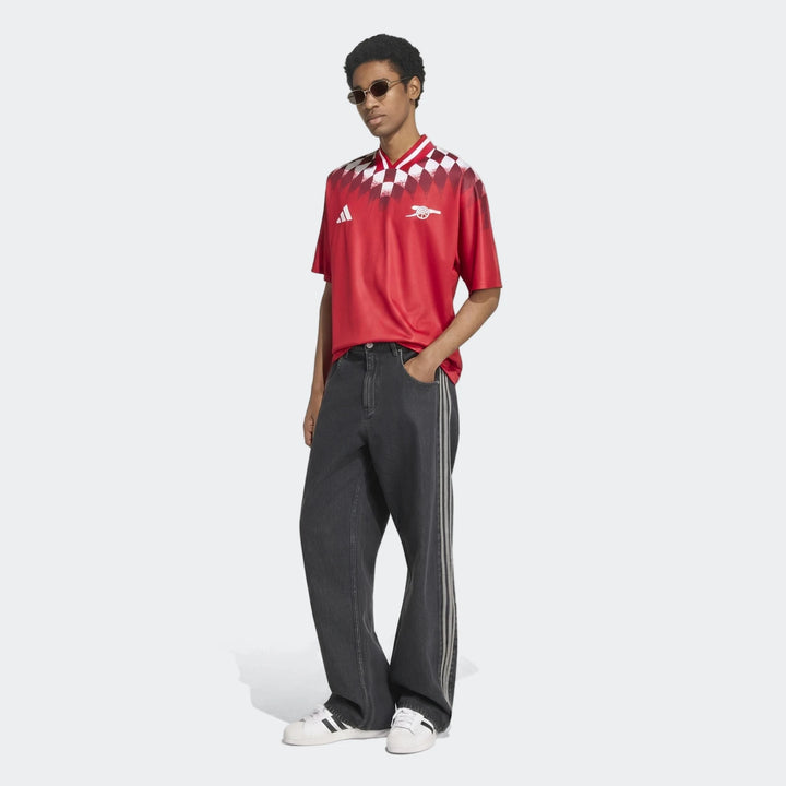 Arsenal FC Street Jersey in red with white checkered yoke and V-neck, short-sleeve football top, front view