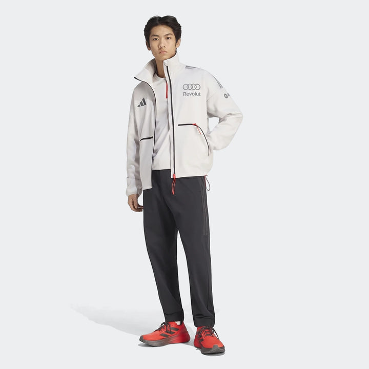 Audi Revolut F1 Team Engineers & Marketing Track Top for men, in a white and black colorway, worn by a model.