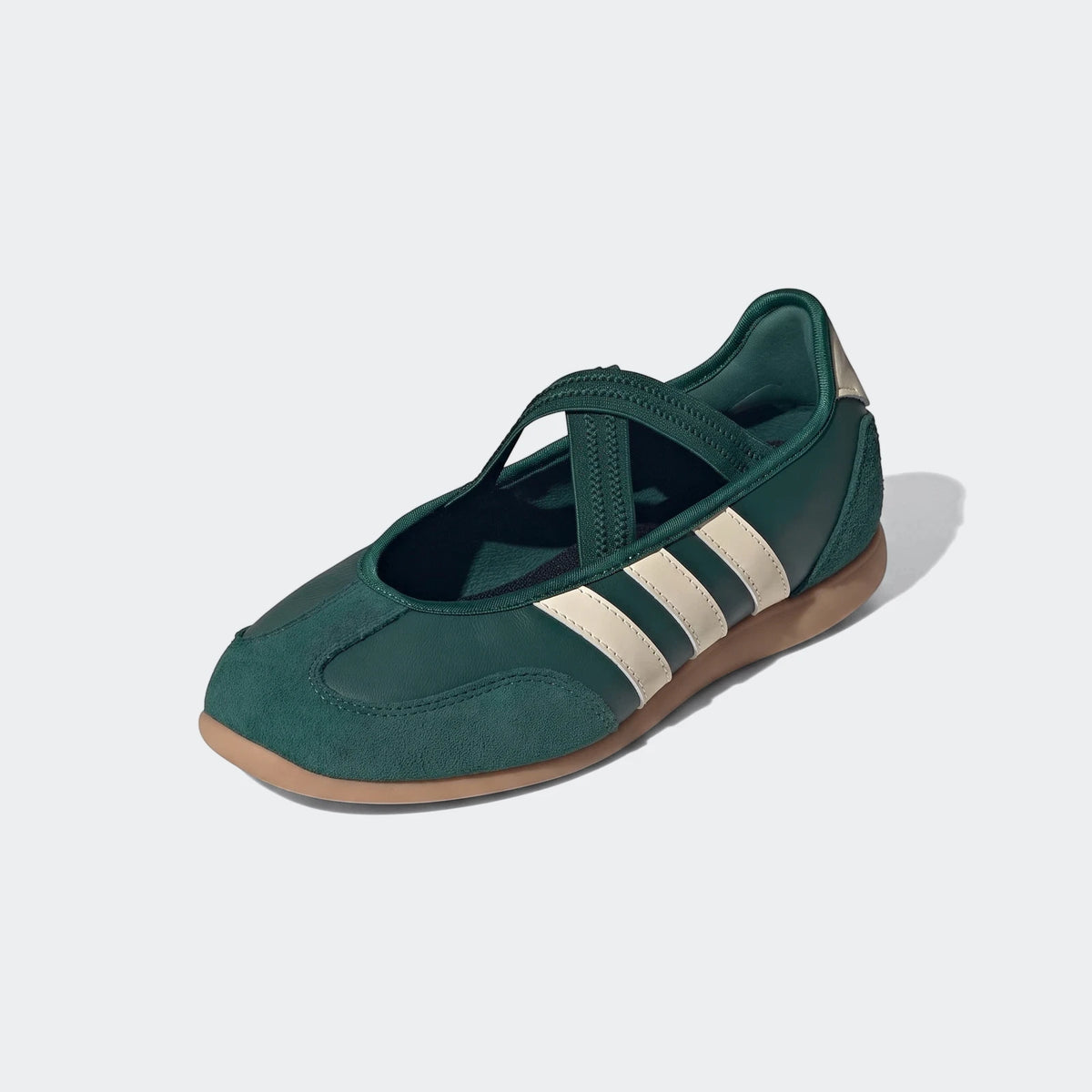 Dark green Barreda Mary Jane shoes with cream adidas stripes and a gum sole, presented from an angled side view.