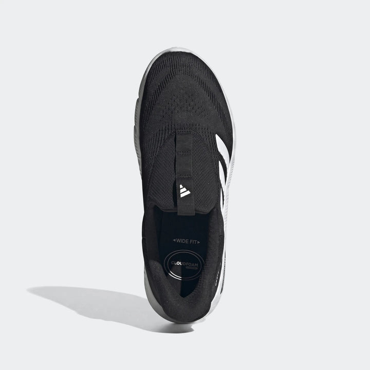 Top-down view of black Adidas Cloudfoam Flex Lounge Rapidaflow shoes with white stripes and sole.