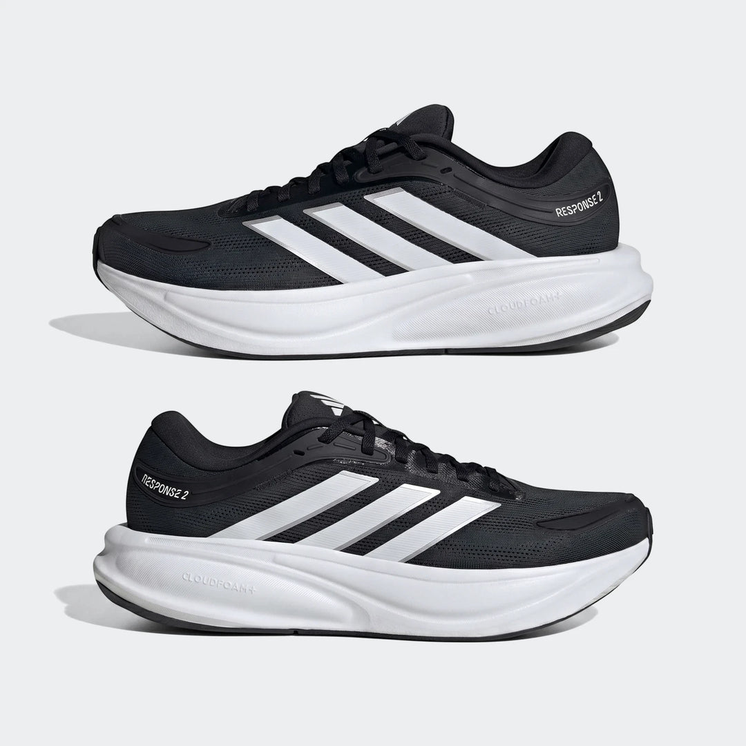 Black Adidas Response 2 running shoes with white stripes and Cloudfoam+ soles, displayed side-by-side on a plain background.