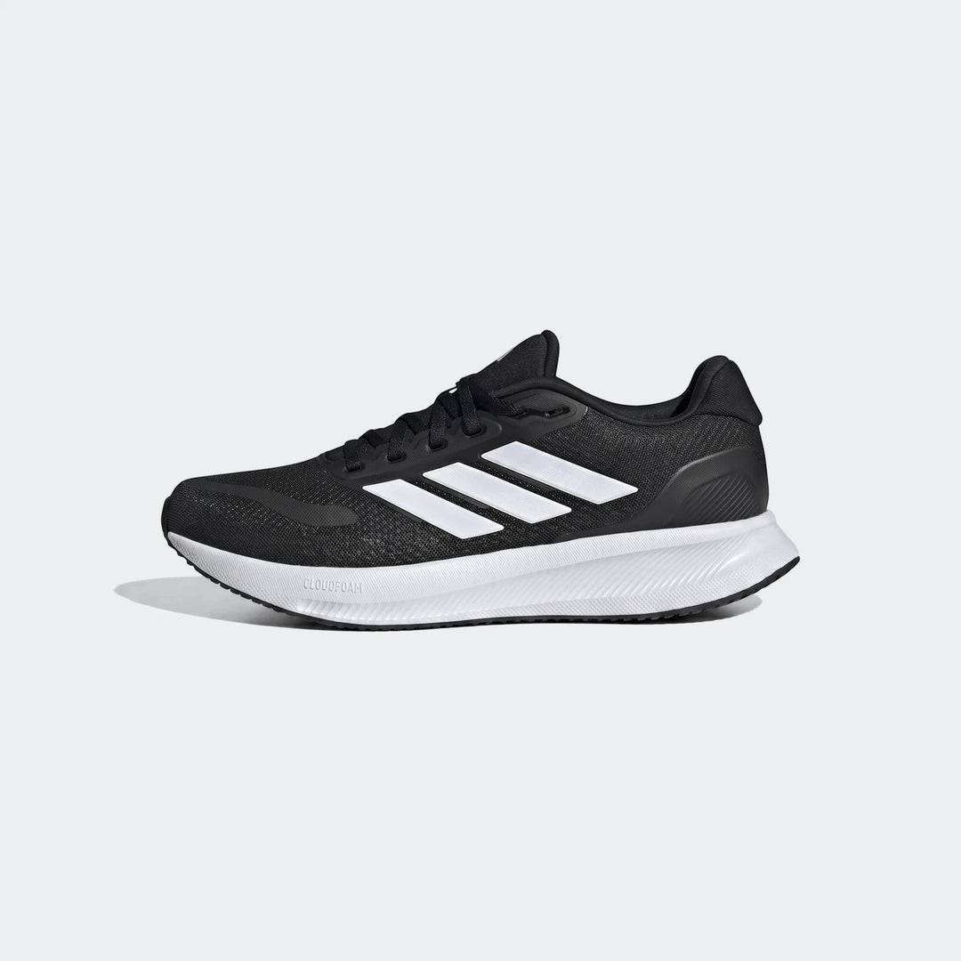 Black Adidas running shoe with white stripes and a thick white sole, shown from a side profile view.