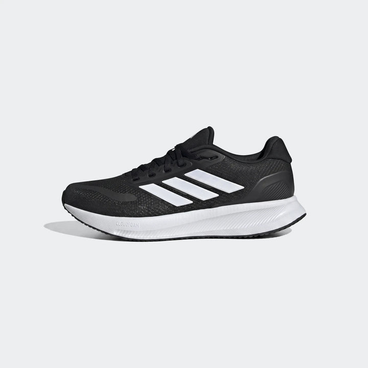 Black Adidas running shoe with white stripes and a thick white sole, shown from a side profile view.