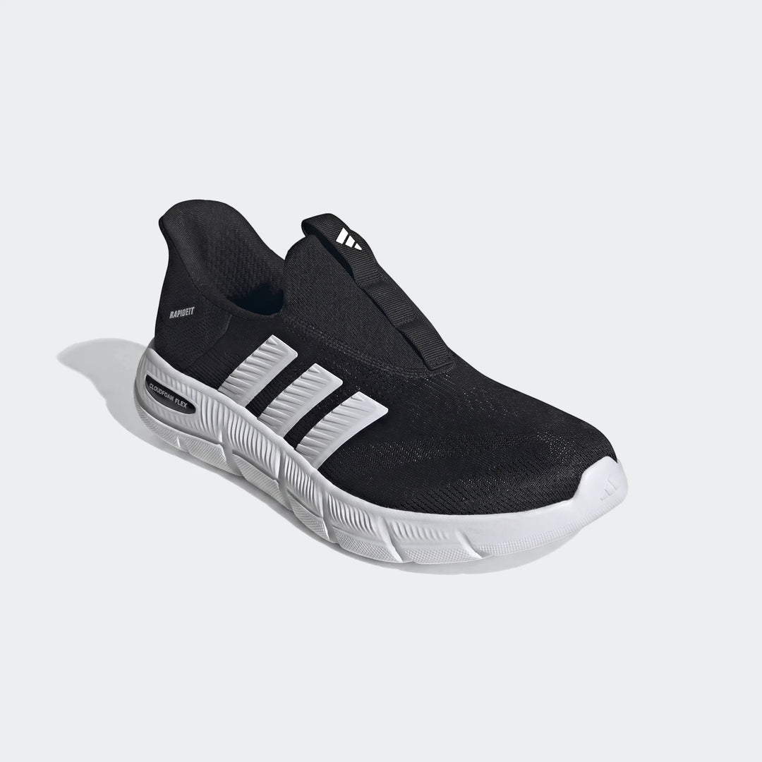 Black Adidas slip-on sneaker with white three-stripes branding, 'Cloudfoam Flex' sole, and 'Rapidfit' detail.