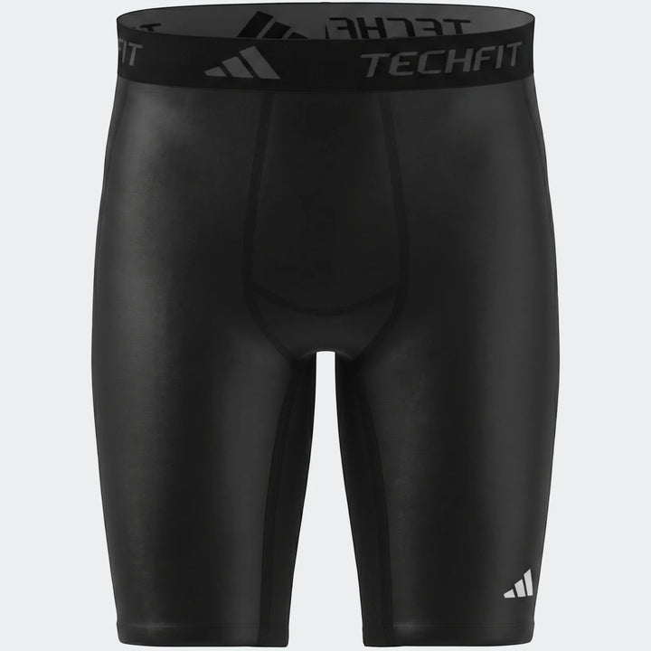 Black Adidas Techfit compression shorts for men, featuring branding on the waistband and leg, shown from the front.