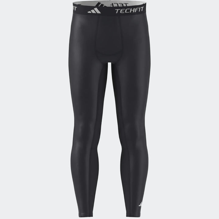 Black Adidas Techfit football base layer compression tights, shown front on a plain background.