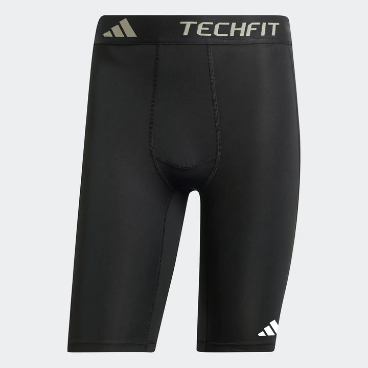 Black Adidas Techfit Football Base Layer Short Tights for men, shown laid flat on a gray background. Features