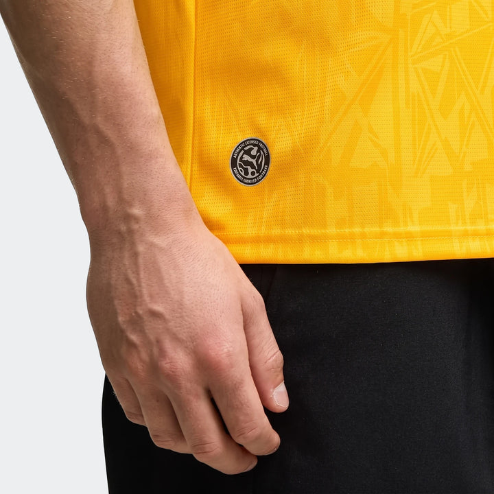Close-up of a man wearing the Borussia Dortmund 26/27 Home Jersey for men, showing the vibrant yellow fabric and authentic