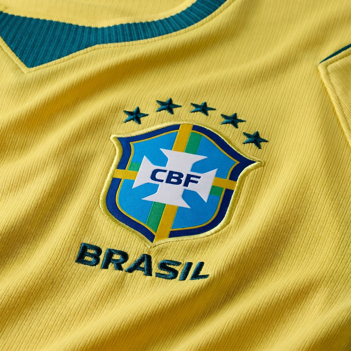 Close-up of a yellow Brazil National Team 2026 Stadium Home Men's Nike Dri-Fit Soccer Jersey, featuring the embroidered CBF