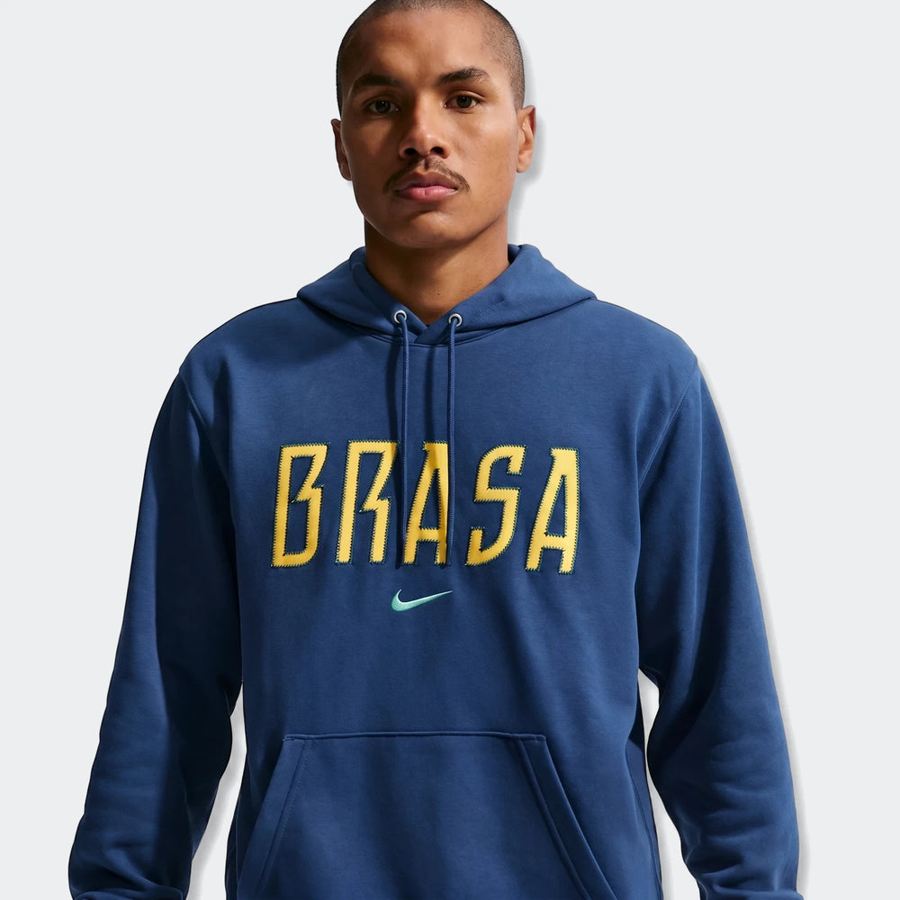Brazil Club Blue Men's Nike Soccer French Terry Pullover Hoodie featuring yellow 'BRASA' embroidery and a green Nike swoosh.